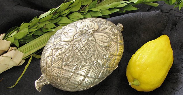 Etrog, silver etrog box and lulav, used on the Jewish holiday of Sukkot